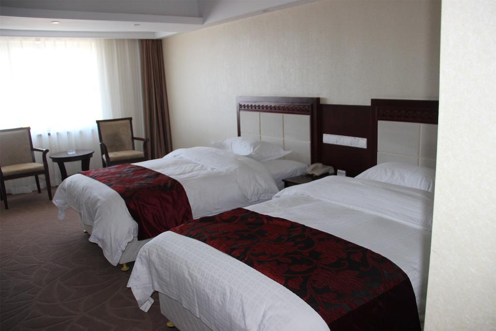Dalian Southern Airline Pearl Hotel Стая снимка