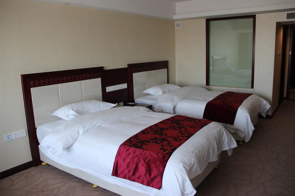 Dalian Southern Airline Pearl Hotel Стая снимка